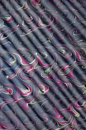 black, purple and green rippled marbled endpaper